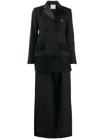 Sacai Tiered Patchwork Long Coat In Black