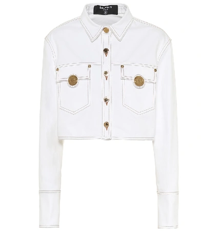 Balmain Button-embellished Cropped Stretch-denim Jacket In 0fa White