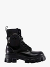 Prada Monolith Brushed Leather And Nylon Boots In Black