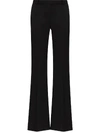 Alexander Mcqueen Tailored Wool Trousers Featuring Flared Hem In Black