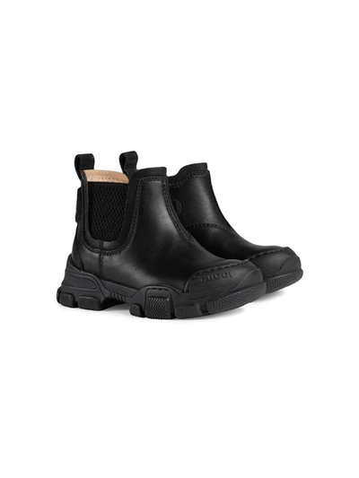 GUCCI LOGO PATCH ANKLE BOOTS