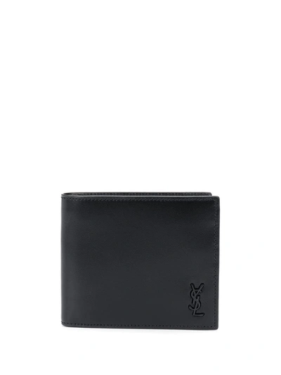 Saint Laurent Embossed Logo Bi-fold Wallet In Black