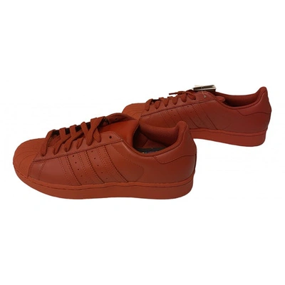 Pre-owned Adidas X Pharrell Williams Leather Trainers In Orange