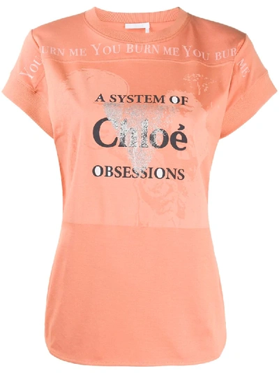 Chloé Slogan-print Curved-hem T-shirt In Orange