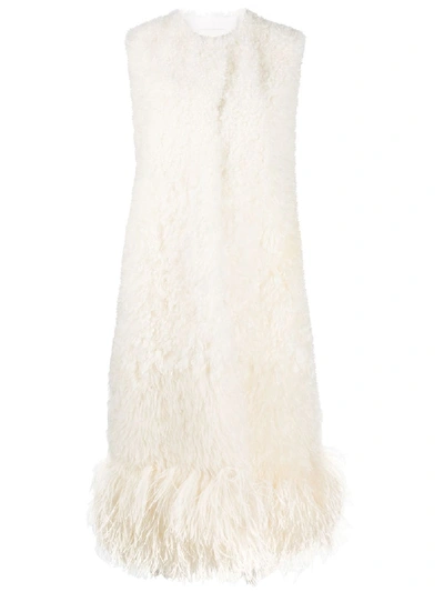Prada Sleeveless Shearling Oversized Coat In Weiss