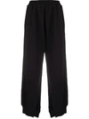 Mm6 Maison Margiela Split-cuff Cotton Track Pants In Black