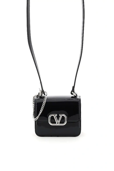 Valentino Garavani Vsling Patent Micro Bag In Black