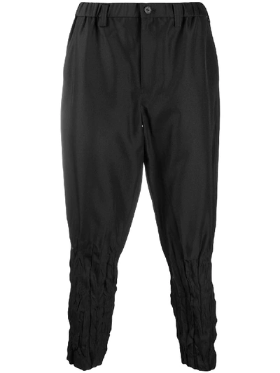 Issey Miyake Cropped Tapered Trousers In Black