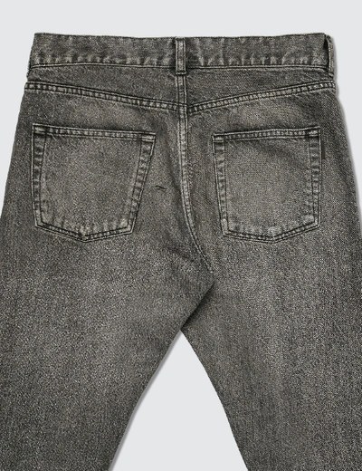 Saint Laurent Distressed Skinny Jeans In Black