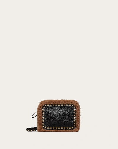 Valentino Garavani Small Rockstud Naplak Calfskin And Shearling Crossbody Bag In Black