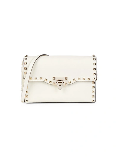 Valentino Garavani Studded Twist Lock Leather Crossbody Bag In Pink