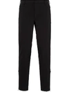 Prada Elasticated Waistband Trousers In Black