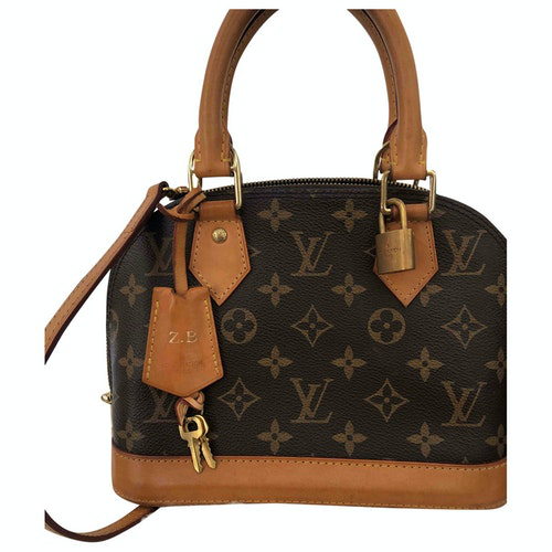 Pre-Owned Louis Vuitton Alma Bb Brown Cloth Handbag | ModeSens