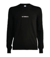 VETEMENTS KNITTED LOGO SWEATER,15677471