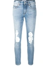 GIVENCHY RIPPED MID-RISE SKINNY JEANS