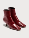 BY FAR LANGE BORDEAUX CREASED LEATHER BOOTS
