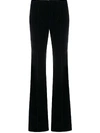 SAINT LAURENT VELVET-EFFECT FLARED TROUSERS