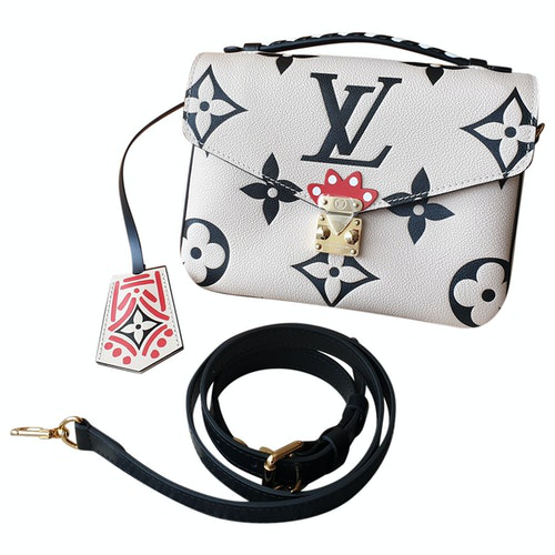 PreOwned Louis Vuitton Metis White Cloth Handbag ModeSens