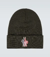 Moncler Logo Patch Ribbed Virgin Wool Beanie In Green