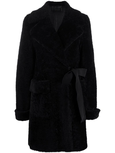Prada Belted Shearling Coat In Black