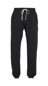 Reigning Champ Slim-fit Loopback Cotton-jersey Sweatpants In Black