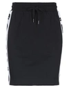 Love Moschino Mini Skirts In Black