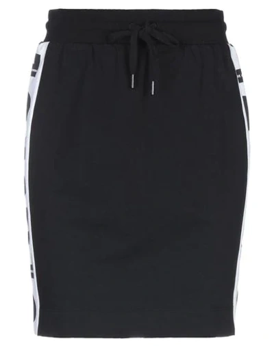 Love Moschino Mini Skirts In Black