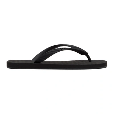 Vetements Logo-embossed Flip Flops In Black