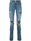 Amiri Mx1 Skinny-fit Panelled Distressed Jeans In Blue