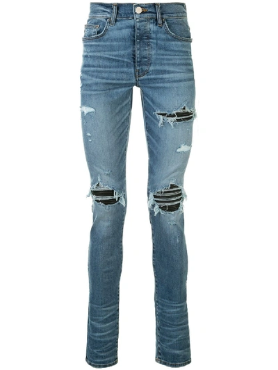 Amiri Mx1 Skinny-fit Panelled Distressed Jeans In Blue