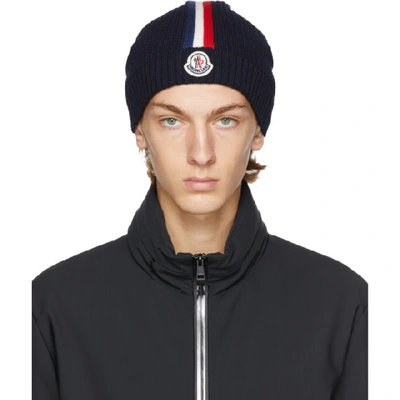 Moncler Logo-appliquéd Striped Waffle-knit Virgin Wool Beanie In Blue