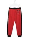 Moschino Panelled Sweatpants In Red