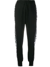 Stella Mccartney Jacquard-trimmed Cotton-fleece Track Pants In Black