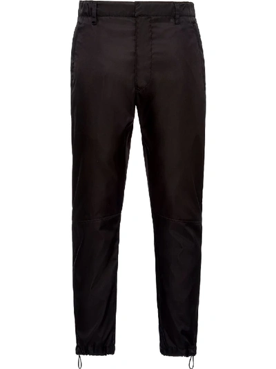 PRADA RE-NYLON CROPPED TROUSERS