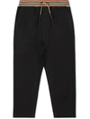 Burberry Icon Stripe Drawstring Trousers In Black