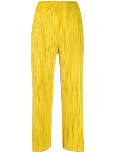 Issey Miyake Pleated Cropped Trousers In Yellow