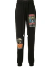 HACULLA MOVIE POSTER PRINT TRACK TROUSERS