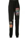 Haculla Movie Poster Print Track Trousers In Black