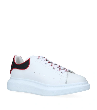 Alexander Mcqueen Exaggerated-sole Rubber-trimmed Leather Sneakers In White,black,red