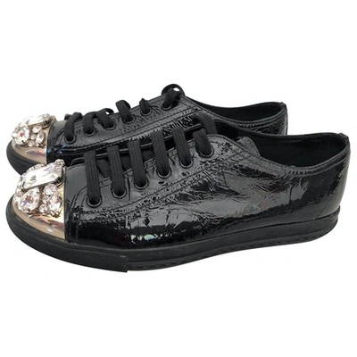 Pre-owned Miu Miu Patent Leather Trainers In Black