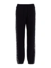Msgm Embroidered Cotton-blend Fleece Track Pants In Black