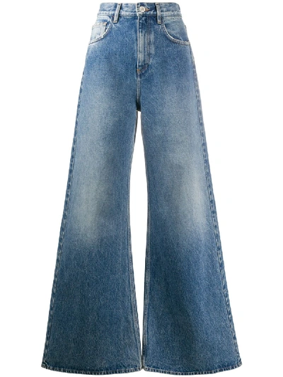 Attico Faded Flared Jeans In Blue