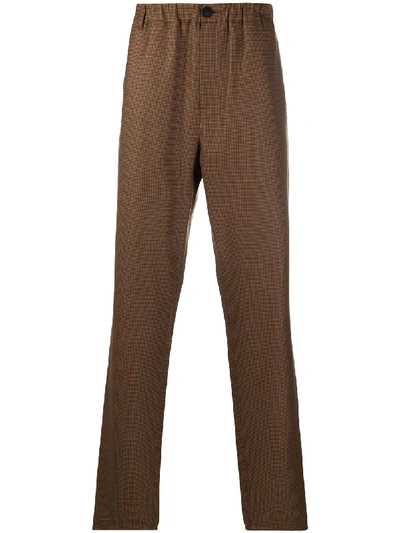 A Kind Of Guise Hounds-tooth Print Trousers In Brown