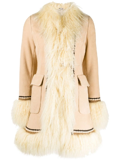 Miu Miu Patterned Trim Shearling Coat In Neutrals