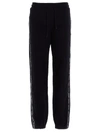 Msgm Embroidered Cotton-blend Fleece Track Pants In Black