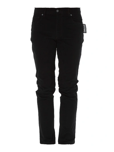 Moschino Tapered Stretch Denim Jeans In Black