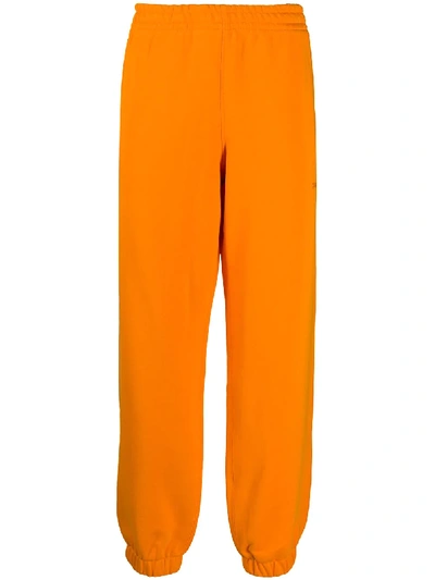 Adidas Originals By Pharrell Williams 平纹针织运动裤 In Orange