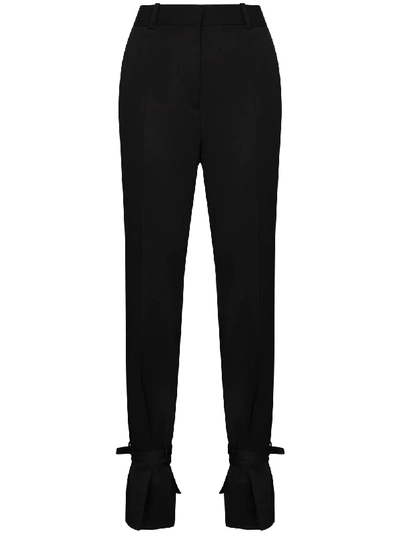 Jw Anderson Slim-leg Wool Trousers With Detachable Cuff Ring In Black