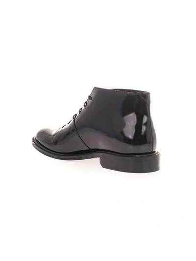 Saint Laurent Patent Boots In Black