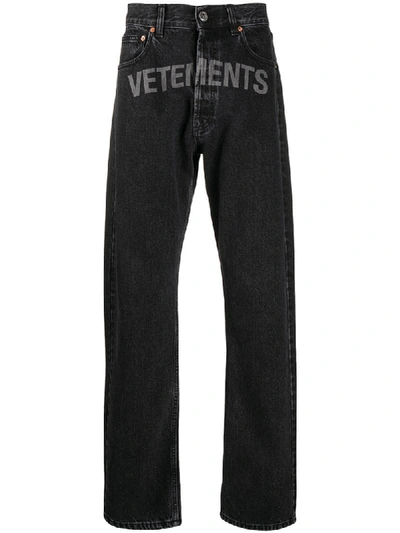 Vetements Logo Print Cotton Denim Jeans In Black